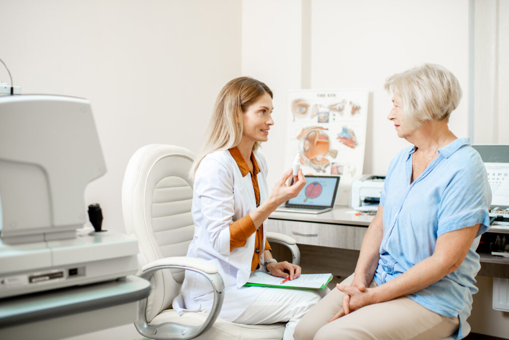 senior patient with ophthalmologist in the office